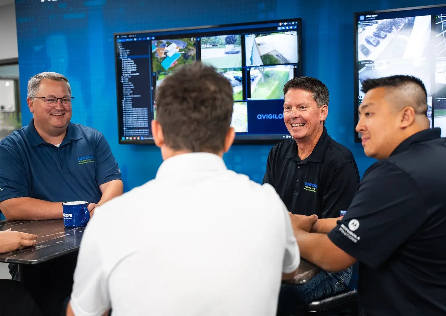 employees-meeting-room-with-tv-displays