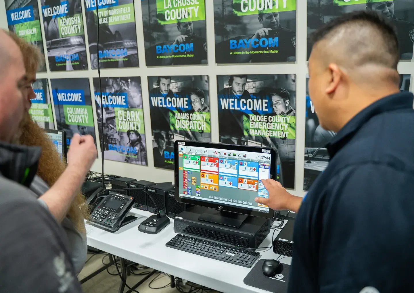 signs-on-wall-people-screen