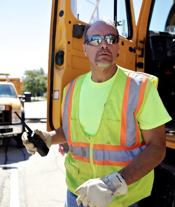 construction-worker-by-truck-with-radio