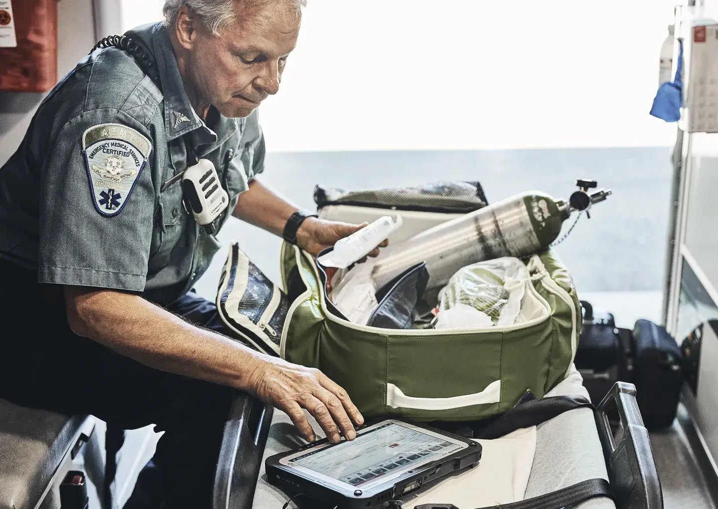 emt-working-on-tablet-device