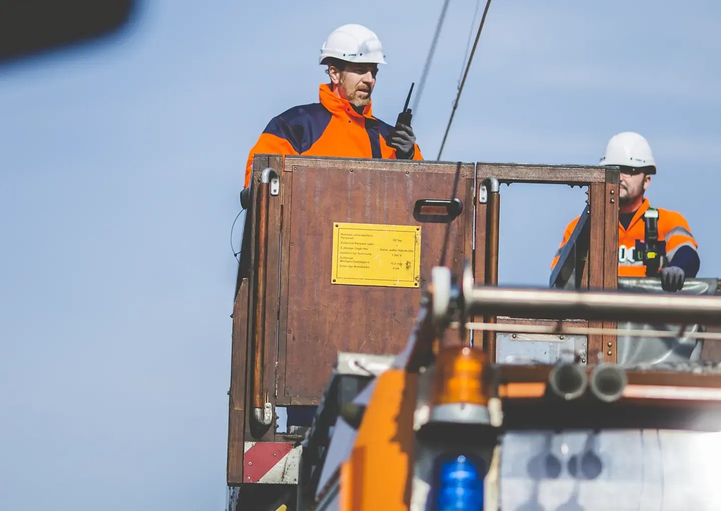 man-on-out-door-lift-with-radio