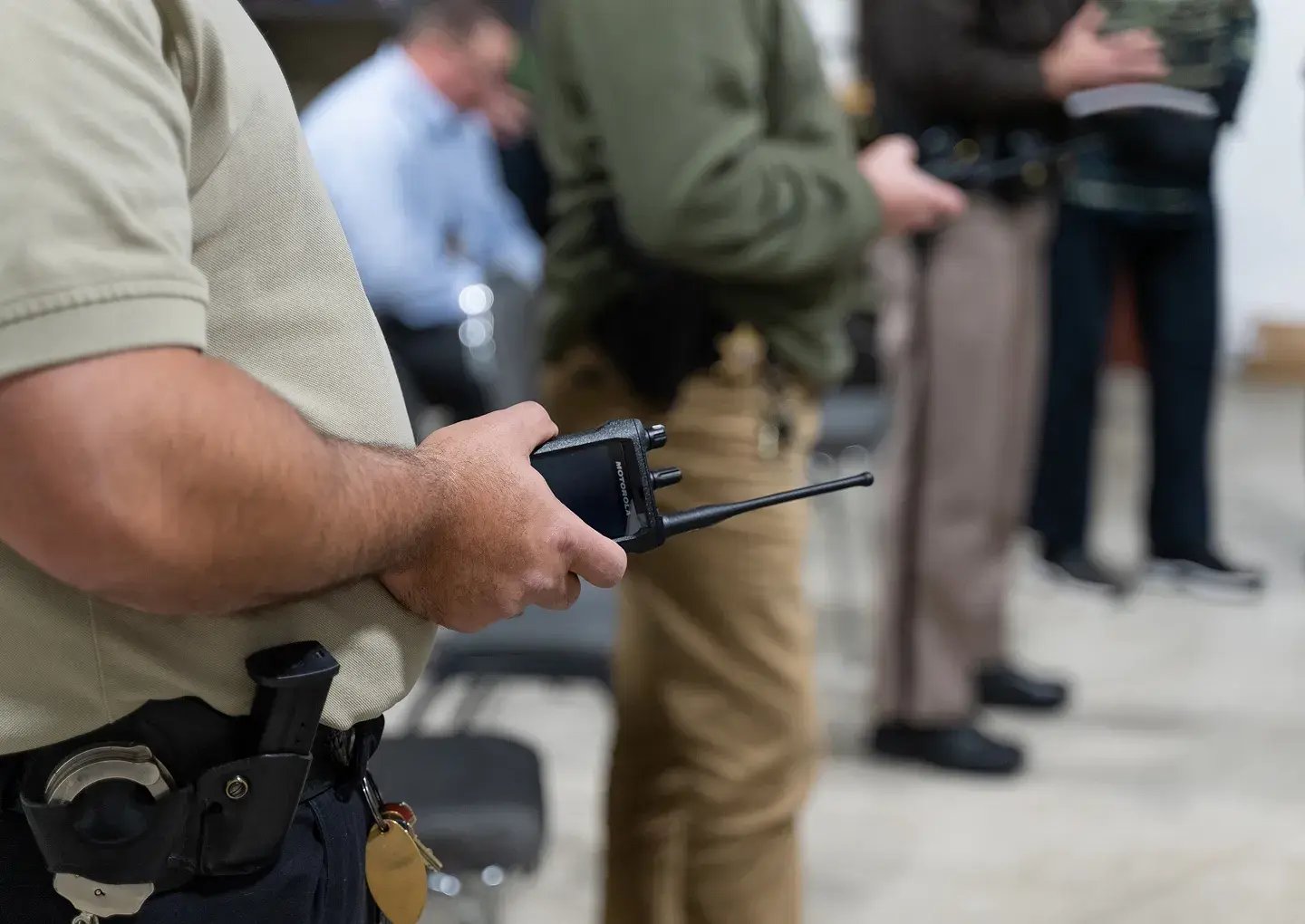 police-with-radio-in-plain-clothes