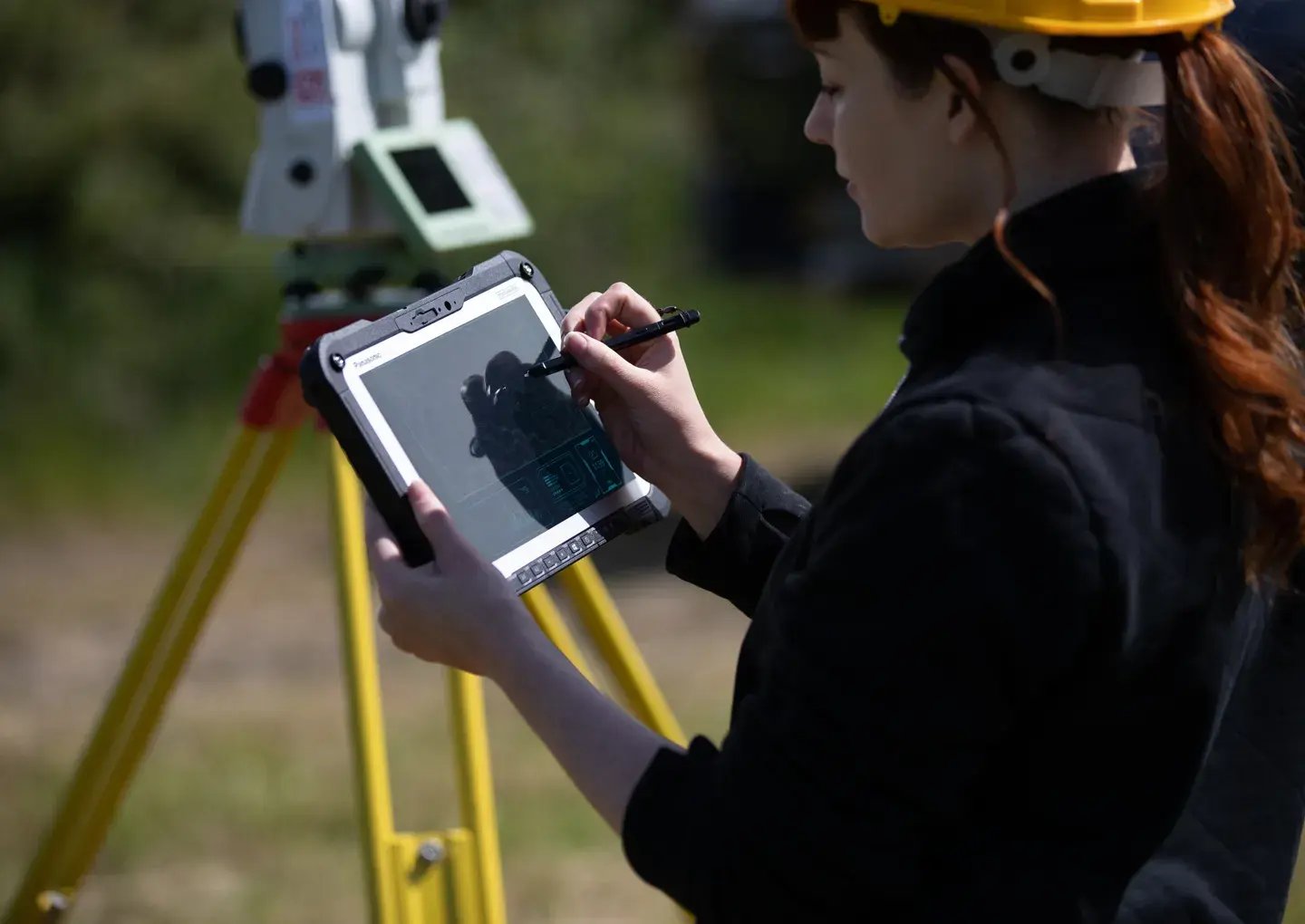 woman-with-survey-equipment