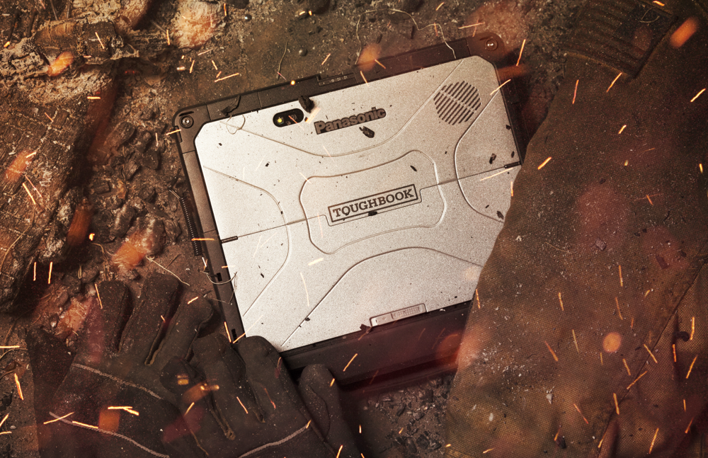 Rugged laptops in fire with gloves